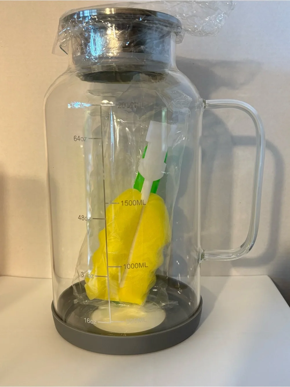 4/68 oz. Glass Pitcher with handle, lid & silicone removable base. New in Box NW